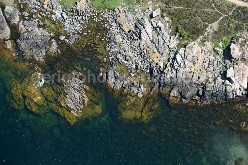 Allinge from above - Blue Water on Coastline at the rocky cliffs of Baltic Sea on Bornholm Island in Allinge in Region Hovedstaden, Denmark