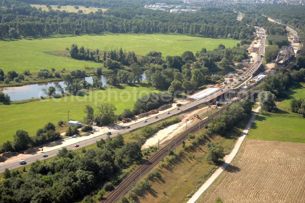 Aerial photograph Dessau-Roßlau - Blick auf verschiedene Brückenbauwerke an der Baustelle zum Ausbau der B184 zwischen Dessau und Roßlau in Sachsen-Anhalt. Die B184 wird aufgrund des gestiegenen Verkehrsaufkommens zwischen 2006 und 2009 als vierstreifige Bundesstraße (RQ 20) über den Verlauf der Elbe hinweg ausgebaut. Bauherr ist der Landesbetrieb Bau Sachsen-Anhalt, die Projektleitung liegt bei SCHÜßLER - PLAN Berlin. Kontakt Projektleitung: Schüßler - Plan Ingenieurgesellschaft mbH, Tel. +49(0)30 42106 0, Email: berlin@schuessler-plan.de