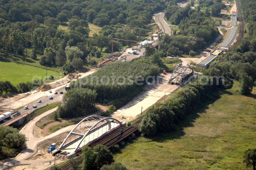 Aerial photograph Dessau-Roßlau - Blick auf verschiedene Brückenbauwerke an der Baustelle zum Ausbau der B184 zwischen Dessau und Roßlau in Sachsen-Anhalt. Die B184 wird aufgrund des gestiegenen Verkehrsaufkommens zwischen 2006 und 2009 als vierstreifige Bundesstraße (RQ 20) über den Verlauf der Elbe hinweg ausgebaut. Bauherr ist der Landesbetrieb Bau Sachsen-Anhalt, die Projektleitung liegt bei SCHÜßLER - PLAN Berlin. Kontakt Projektleitung: Schüßler - Plan Ingenieurgesellschaft mbH, Tel. +49(0)30 42106 0, Email: berlin@schuessler-plan.de