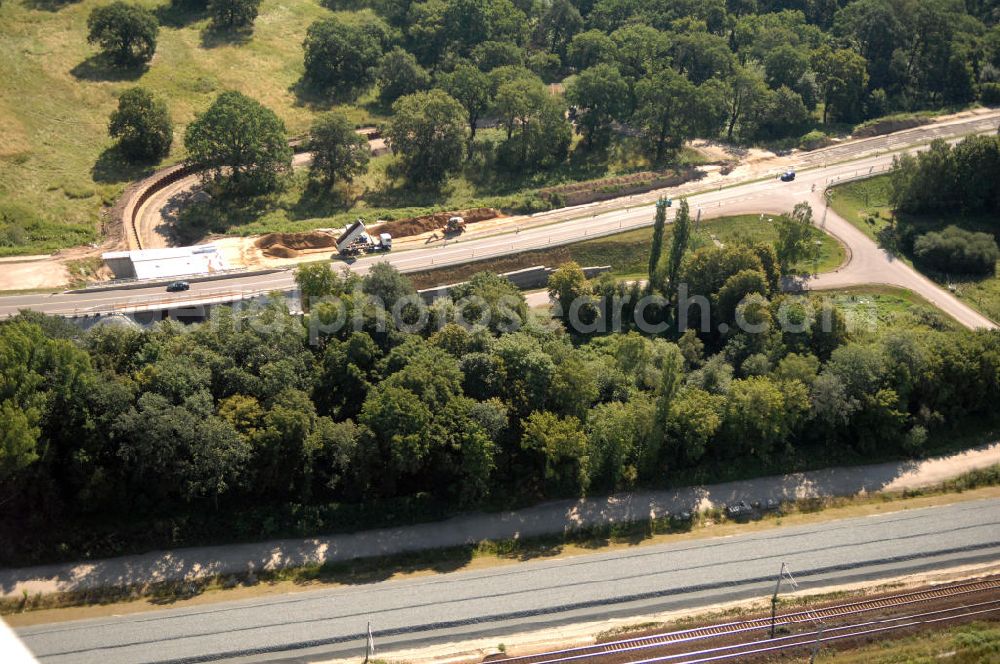 Aerial image Dessau-Roßlau - Blick auf verschiedene Brückenbauwerke an der Baustelle zum Ausbau der B184 zwischen Dessau und Roßlau in Sachsen-Anhalt. Die B184 wird aufgrund des gestiegenen Verkehrsaufkommens zwischen 2006 und 2009 als vierstreifige Bundesstraße (RQ 20) über den Verlauf der Elbe hinweg ausgebaut. Bauherr ist der Landesbetrieb Bau Sachsen-Anhalt, die Projektleitung liegt bei SCHÜßLER - PLAN Berlin. Kontakt Projektleitung: Schüßler - Plan Ingenieurgesellschaft mbH, Tel. +49(0)30 42106 0, Email: berlin@schuessler-plan.de