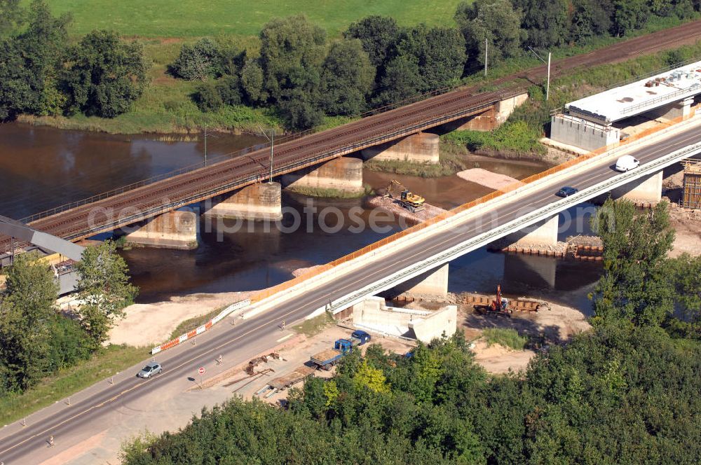 Aerial image Dessau-Roßlau - Blick auf verschiedene Brückenbauwerke an der Baustelle zum Ausbau der B184 zwischen Dessau und Roßlau in Sachsen-Anhalt. Die B184 wird aufgrund des gestiegenen Verkehrsaufkommens zwischen 2006 und 2009 als vierstreifige Bundesstraße (RQ 20) über den Verlauf der Elbe hinweg ausgebaut. Bauherr ist der Landesbetrieb Bau Sachsen-Anhalt, die Projektleitung liegt bei SCHÜßLER - PLAN Berlin. Kontakt Projektleitung: Schüßler - Plan Ingenieurgesellschaft mbH, Tel. +49(0)30 42106 0, Email: berlin@schuessler-plan.de