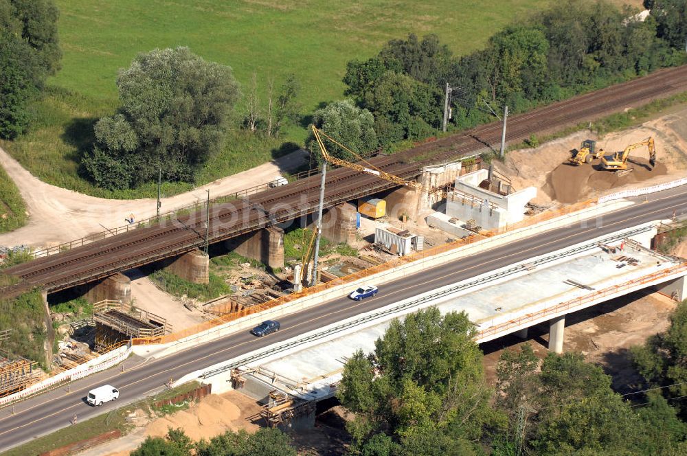 Dessau-Roßlau from the bird's eye view: Blick auf verschiedene Brückenbauwerke an der Baustelle zum Ausbau der B184 zwischen Dessau und Roßlau in Sachsen-Anhalt. Die B184 wird aufgrund des gestiegenen Verkehrsaufkommens zwischen 2006 und 2009 als vierstreifige Bundesstraße (RQ 20) über den Verlauf der Elbe hinweg ausgebaut. Bauherr ist der Landesbetrieb Bau Sachsen-Anhalt, die Projektleitung liegt bei SCHÜßLER - PLAN Berlin. Kontakt Projektleitung: Schüßler - Plan Ingenieurgesellschaft mbH, Tel. +49(0)30 42106 0, Email: berlin@schuessler-plan.de