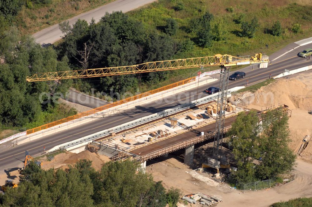 Aerial photograph Dessau-Roßlau - Blick auf verschiedene Brückenbauwerke an der Baustelle zum Ausbau der B184 zwischen Dessau und Roßlau in Sachsen-Anhalt. Die B184 wird aufgrund des gestiegenen Verkehrsaufkommens zwischen 2006 und 2009 als vierstreifige Bundesstraße (RQ 20) über den Verlauf der Elbe hinweg ausgebaut. Bauherr ist der Landesbetrieb Bau Sachsen-Anhalt, die Projektleitung liegt bei SCHÜßLER - PLAN Berlin. Kontakt Projektleitung: Schüßler - Plan Ingenieurgesellschaft mbH, Tel. +49(0)30 42106 0, Email: berlin@schuessler-plan.de