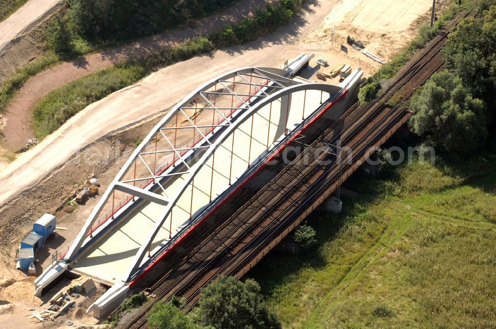 Dessau-Roßlau from the bird's eye view: Blick auf verschiedene Brückenbauwerke an der Baustelle zum Ausbau der B184 zwischen Dessau und Roßlau in Sachsen-Anhalt. Die B184 wird aufgrund des gestiegenen Verkehrsaufkommens zwischen 2006 und 2009 als vierstreifige Bundesstraße (RQ 20) über den Verlauf der Elbe hinweg ausgebaut. Bauherr ist der Landesbetrieb Bau Sachsen-Anhalt, die Projektleitung liegt bei SCHÜßLER - PLAN Berlin. Kontakt Projektleitung: Schüßler - Plan Ingenieurgesellschaft mbH, Tel. +49(0)30 42106 0, Email: berlin@schuessler-plan.de