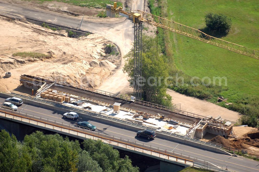 Aerial image Dessau-Roßlau - Blick auf verschiedene Brückenbauwerke an der Baustelle zum Ausbau der B184 zwischen Dessau und Roßlau in Sachsen-Anhalt. Die B184 wird aufgrund des gestiegenen Verkehrsaufkommens zwischen 2006 und 2009 als vierstreifige Bundesstraße (RQ 20) über den Verlauf der Elbe hinweg ausgebaut. Bauherr ist der Landesbetrieb Bau Sachsen-Anhalt, die Projektleitung liegt bei SCHÜßLER - PLAN Berlin. Kontakt Projektleitung: Schüßler - Plan Ingenieurgesellschaft mbH, Tel. +49(0)30 42106 0, Email: berlin@schuessler-plan.de