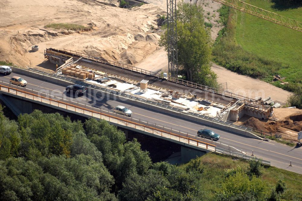 Aerial photograph Dessau-Roßlau - Blick auf verschiedene Brückenbauwerke an der Baustelle zum Ausbau der B184 zwischen Dessau und Roßlau in Sachsen-Anhalt. Die B184 wird aufgrund des gestiegenen Verkehrsaufkommens zwischen 2006 und 2009 als vierstreifige Bundesstraße (RQ 20) über den Verlauf der Elbe hinweg ausgebaut. Bauherr ist der Landesbetrieb Bau Sachsen-Anhalt, die Projektleitung liegt bei SCHÜßLER - PLAN Berlin. Kontakt Projektleitung: Schüßler - Plan Ingenieurgesellschaft mbH, Tel. +49(0)30 42106 0, Email: berlin@schuessler-plan.de