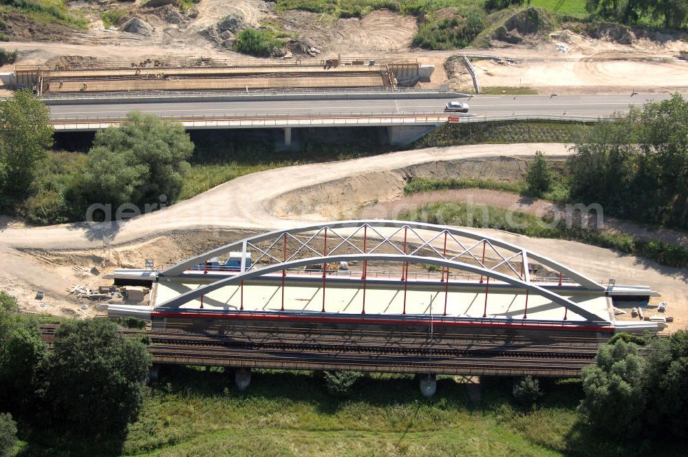 Dessau-Roßlau from the bird's eye view: Blick auf verschiedene Brückenbauwerke an der Baustelle zum Ausbau der B184 zwischen Dessau und Roßlau in Sachsen-Anhalt. Die B184 wird aufgrund des gestiegenen Verkehrsaufkommens zwischen 2006 und 2009 als vierstreifige Bundesstraße (RQ 20) über den Verlauf der Elbe hinweg ausgebaut. Bauherr ist der Landesbetrieb Bau Sachsen-Anhalt, die Projektleitung liegt bei SCHÜßLER - PLAN Berlin. Kontakt Projektleitung: Schüßler - Plan Ingenieurgesellschaft mbH, Tel. +49(0)30 42106 0, Email: berlin@schuessler-plan.de