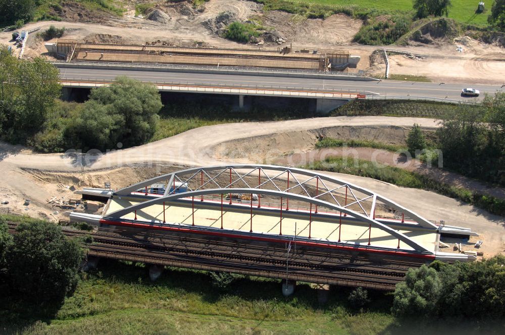 Aerial image Dessau-Roßlau - Blick auf verschiedene Brückenbauwerke an der Baustelle zum Ausbau der B184 zwischen Dessau und Roßlau in Sachsen-Anhalt. Die B184 wird aufgrund des gestiegenen Verkehrsaufkommens zwischen 2006 und 2009 als vierstreifige Bundesstraße (RQ 20) über den Verlauf der Elbe hinweg ausgebaut. Bauherr ist der Landesbetrieb Bau Sachsen-Anhalt, die Projektleitung liegt bei SCHÜßLER - PLAN Berlin. Kontakt Projektleitung: Schüßler - Plan Ingenieurgesellschaft mbH, Tel. +49(0)30 42106 0, Email: berlin@schuessler-plan.de