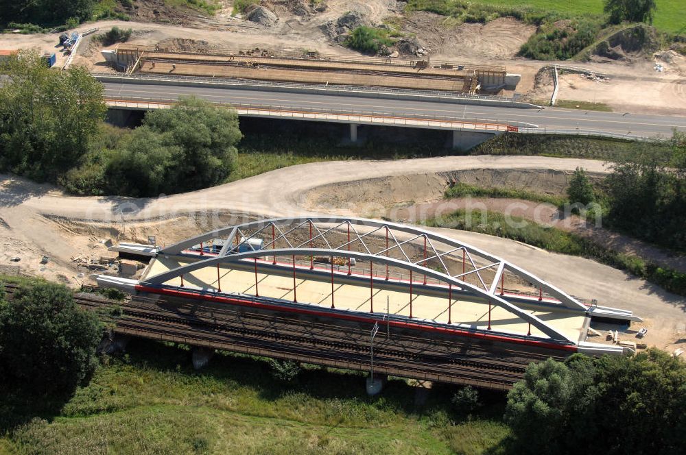 Aerial photograph Dessau-Roßlau - Blick auf verschiedene Brückenbauwerke an der Baustelle zum Ausbau der B184 zwischen Dessau und Roßlau in Sachsen-Anhalt. Die B184 wird aufgrund des gestiegenen Verkehrsaufkommens zwischen 2006 und 2009 als vierstreifige Bundesstraße (RQ 20) über den Verlauf der Elbe hinweg ausgebaut. Bauherr ist der Landesbetrieb Bau Sachsen-Anhalt, die Projektleitung liegt bei SCHÜßLER - PLAN Berlin. Kontakt Projektleitung: Schüßler - Plan Ingenieurgesellschaft mbH, Tel. +49(0)30 42106 0, Email: berlin@schuessler-plan.de