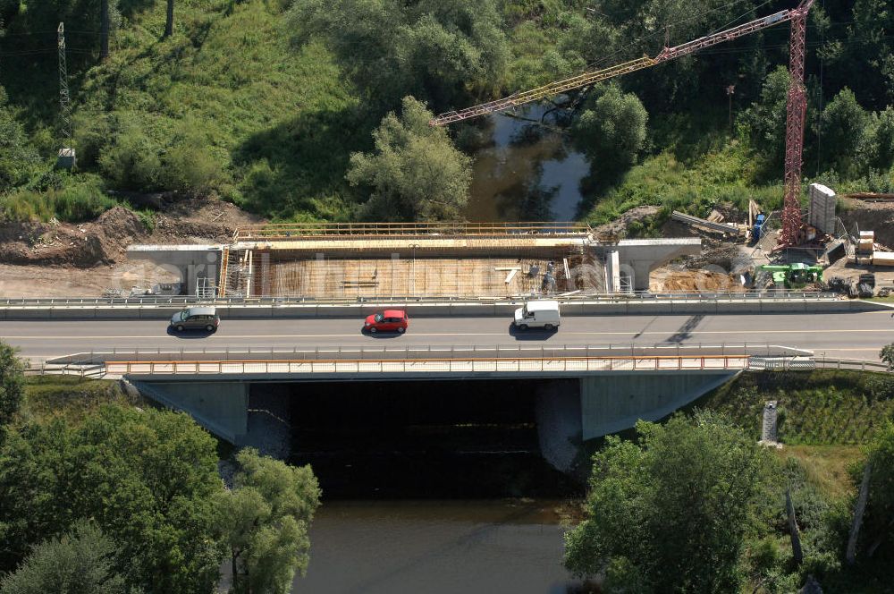 Aerial photograph Dessau-Roßlau - Blick auf verschiedene Brückenbauwerke an der Baustelle zum Ausbau der B184 zwischen Dessau und Roßlau in Sachsen-Anhalt. Die B184 wird aufgrund des gestiegenen Verkehrsaufkommens zwischen 2006 und 2009 als vierstreifige Bundesstraße (RQ 20) über den Verlauf der Elbe hinweg ausgebaut. Bauherr ist der Landesbetrieb Bau Sachsen-Anhalt, die Projektleitung liegt bei SCHÜßLER - PLAN Berlin. Kontakt Projektleitung: Schüßler - Plan Ingenieurgesellschaft mbH, Tel. +49(0)30 42106 0, Email: berlin@schuessler-plan.de