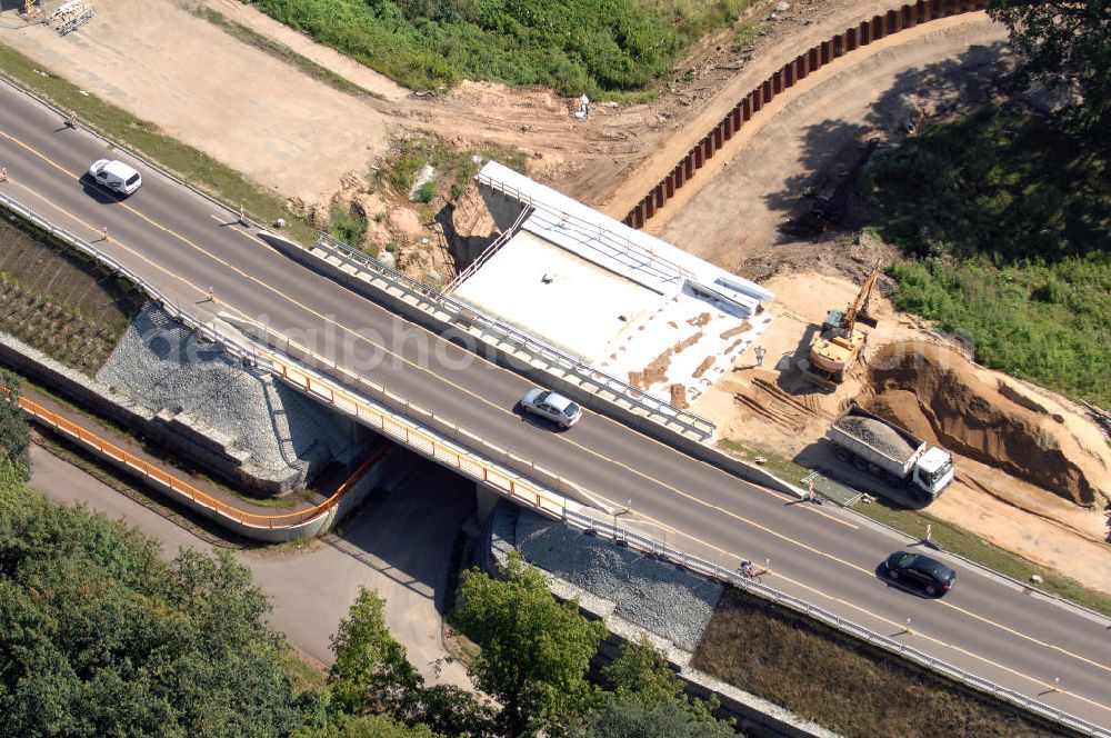 Aerial image Dessau-Roßlau - Blick auf verschiedene Brückenbauwerke an der Baustelle zum Ausbau der B184 zwischen Dessau und Roßlau in Sachsen-Anhalt. Die B184 wird aufgrund des gestiegenen Verkehrsaufkommens zwischen 2006 und 2009 als vierstreifige Bundesstraße (RQ 20) über den Verlauf der Elbe hinweg ausgebaut. Bauherr ist der Landesbetrieb Bau Sachsen-Anhalt, die Projektleitung liegt bei SCHÜßLER - PLAN Berlin. Kontakt Projektleitung: Schüßler - Plan Ingenieurgesellschaft mbH, Tel. +49(0)30 42106 0, Email: berlin@schuessler-plan.de