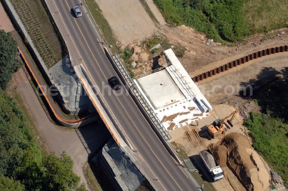 Aerial photograph Dessau-Roßlau - Blick auf verschiedene Brückenbauwerke an der Baustelle zum Ausbau der B184 zwischen Dessau und Roßlau in Sachsen-Anhalt. Die B184 wird aufgrund des gestiegenen Verkehrsaufkommens zwischen 2006 und 2009 als vierstreifige Bundesstraße (RQ 20) über den Verlauf der Elbe hinweg ausgebaut. Bauherr ist der Landesbetrieb Bau Sachsen-Anhalt, die Projektleitung liegt bei SCHÜßLER - PLAN Berlin. Kontakt Projektleitung: Schüßler - Plan Ingenieurgesellschaft mbH, Tel. +49(0)30 42106 0, Email: berlin@schuessler-plan.de