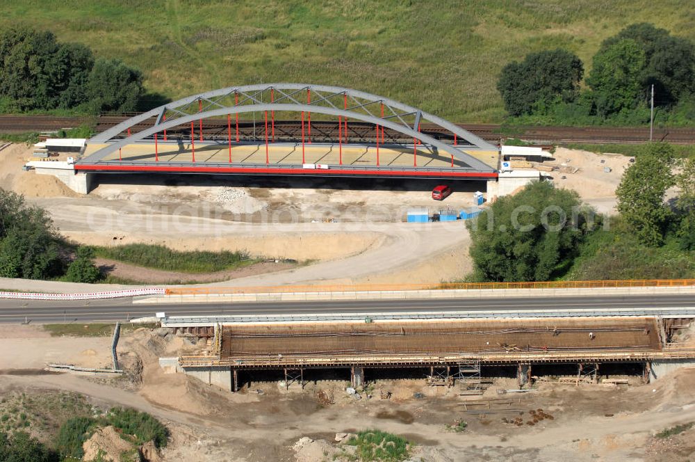 Aerial image Dessau-Roßlau - Blick auf verschiedene Brückenbauwerke an der Baustelle zum Ausbau der B184 zwischen Dessau und Roßlau in Sachsen-Anhalt. Die B184 wird aufgrund des gestiegenen Verkehrsaufkommens zwischen 2006 und 2009 als vierstreifige Bundesstraße (RQ 20) über den Verlauf der Elbe hinweg ausgebaut. Bauherr ist der Landesbetrieb Bau Sachsen-Anhalt, die Projektleitung liegt bei SCHÜßLER - PLAN Berlin. Kontakt Projektleitung: Schüßler - Plan Ingenieurgesellschaft mbH, Tel. +49(0)30 42106 0, Email: berlin@schuessler-plan.de