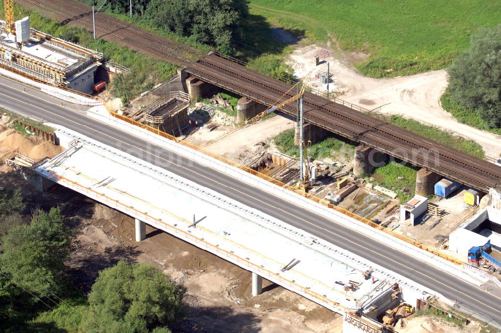 Aerial image Dessau-Roßlau - Blick auf verschiedene Brückenbauwerke an der Baustelle zum Ausbau der B184 zwischen Dessau und Roßlau in Sachsen-Anhalt. Die B184 wird aufgrund des gestiegenen Verkehrsaufkommens zwischen 2006 und 2009 als vierstreifige Bundesstraße (RQ 20) über den Verlauf der Elbe hinweg ausgebaut. Bauherr ist der Landesbetrieb Bau Sachsen-Anhalt, die Projektleitung liegt bei SCHÜßLER - PLAN Berlin. Kontakt Projektleitung: Schüßler - Plan Ingenieurgesellschaft mbH, Tel. +49(0)30 42106 0, Email: berlin@schuessler-plan.de