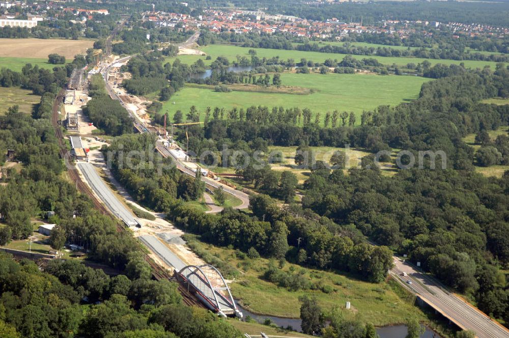 Aerial photograph Dessau-Roßlau - Blick auf verschiedene Brückenbauwerke an der Baustelle zum Ausbau der B184 zwischen Dessau und Roßlau in Sachsen-Anhalt. Die B184 wird aufgrund des gestiegenen Verkehrsaufkommens zwischen 2006 und 2009 als vierstreifige Bundesstraße (RQ 20) über den Verlauf der Elbe hinweg ausgebaut. Bauherr ist der Landesbetrieb Bau Sachsen-Anhalt, die Projektleitung liegt bei SCHÜßLER - PLAN Berlin. Kontakt Projektleitung: Schüßler - Plan Ingenieurgesellschaft mbH, Tel. +49(0)30 42106 0, Email: berlin@schuessler-plan.de