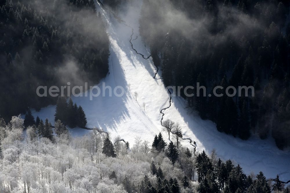 Gehlberg from the bird's eye view: Stream in winter landscape in Gehlberg in Thuringia