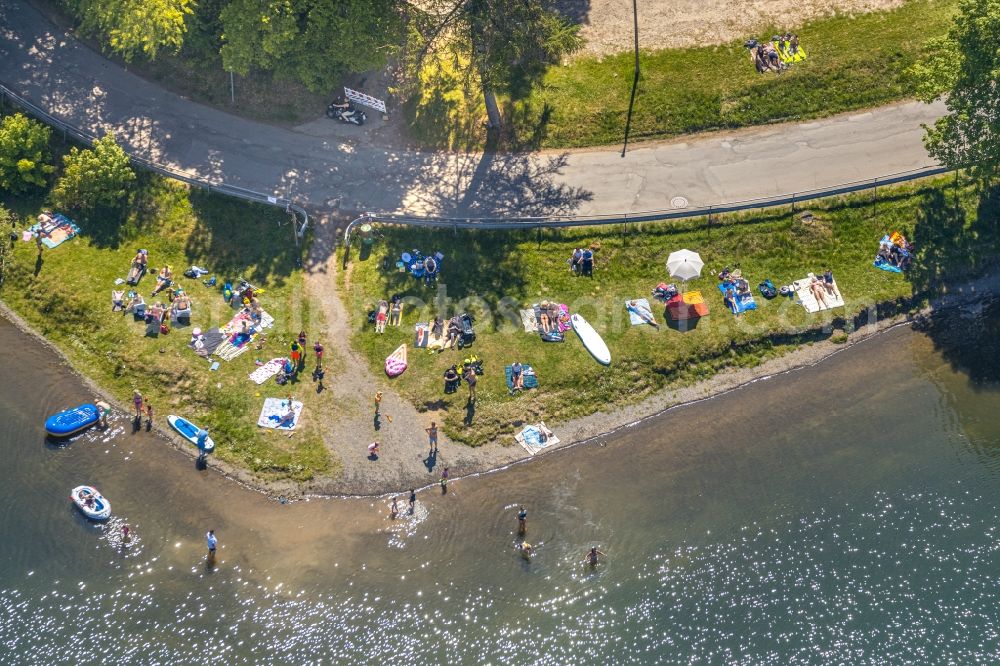 Aerial image Herpel - Bathers look to cool off in summer on the banks of the Lister-Talsperre in Herpel in the state North Rhine-Westphalia, Germany