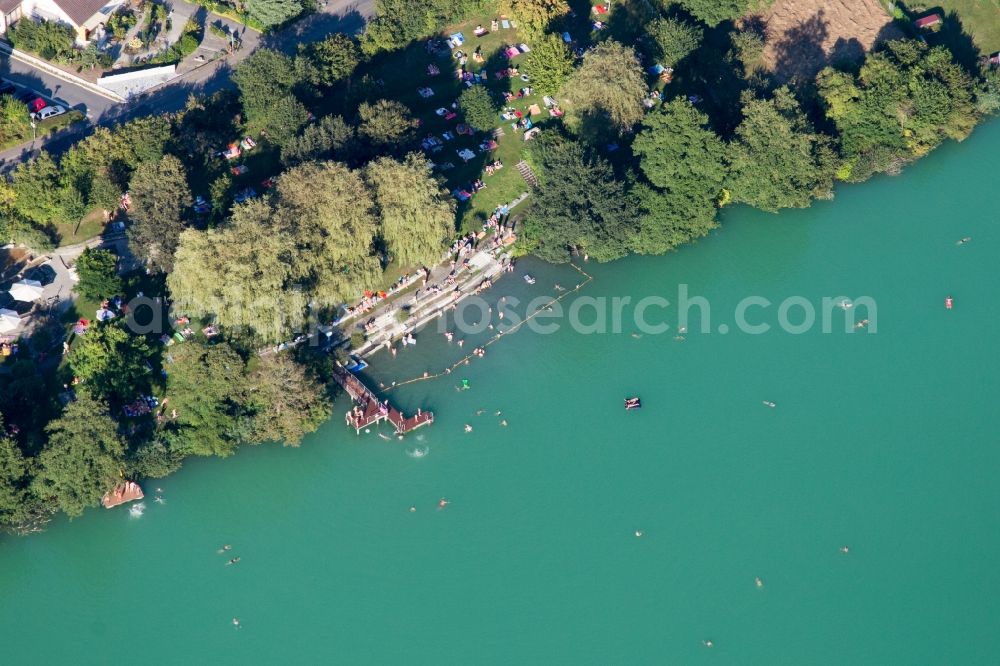 Steißlingen from above - Swimmers at the Lake of Steisslingen in Steisslingen in the state Baden-Wuerttemberg