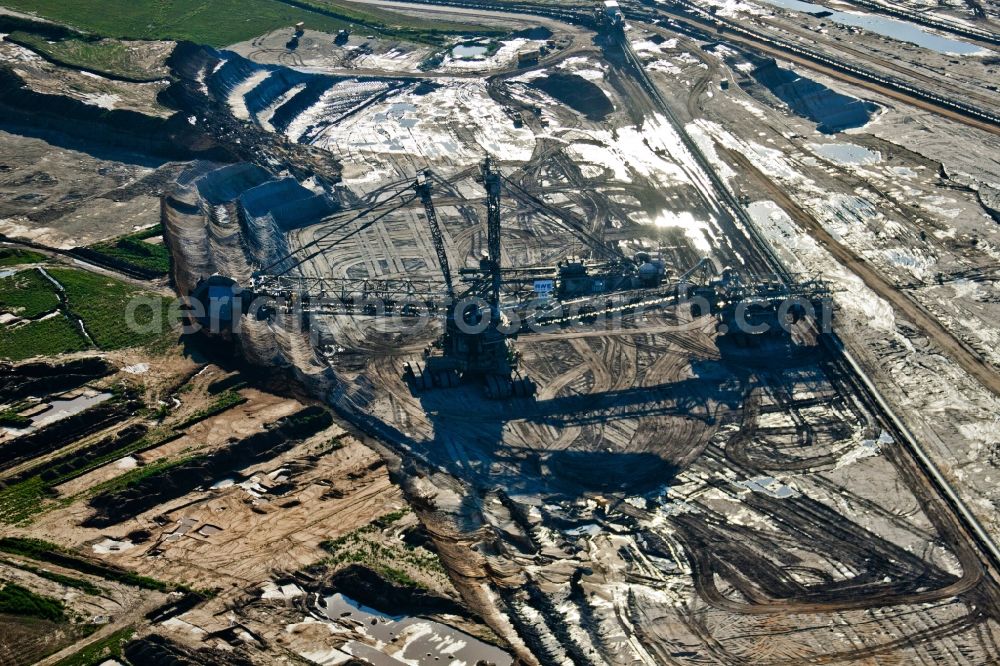 Inden from above - Dredging conveyor bridge in brown coal mine in Inden in the state North Rhine-Westphalia