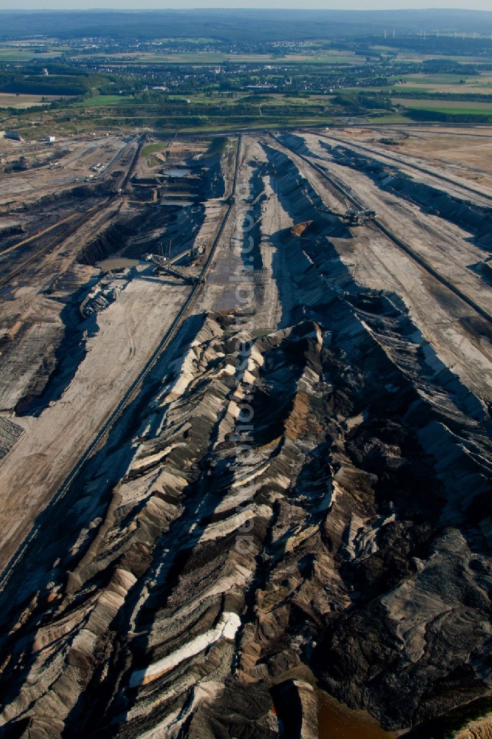 Inden from the bird's eye view: Dredging conveyor bridge in brown coal mine in Inden in the state North Rhine-Westphalia