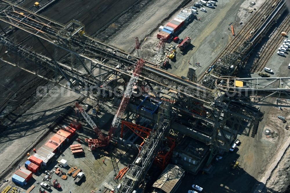 Aerial image Nochten - Dredging conveyor bridge in brown coal mine der Vattenfall Europe Sales GmbH in Nochten in the state Saxony. The company TAKRAF GmbH - Tenova exchanged at Greater excavator with a roller table of the great rocker of the 40-year-old excavator