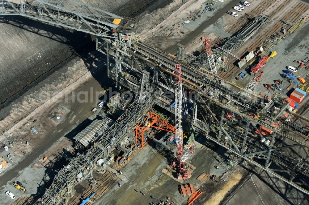 Nochten from above - Dredging conveyor bridge in brown coal mine der Vattenfall Europe Sales GmbH in Nochten in the state Saxony. The company TAKRAF GmbH - Tenova exchanged at Greater excavator with a roller table of the great rocker of the 40-year-old excavator