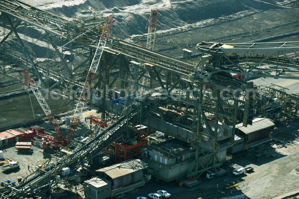 Aerial image Nochten - Dredging conveyor bridge in brown coal mine der Vattenfall Europe Sales GmbH in Nochten in the state Saxony. The company TAKRAF GmbH - Tenova exchanged at Greater excavator with a roller table of the great rocker of the 40-year-old excavator