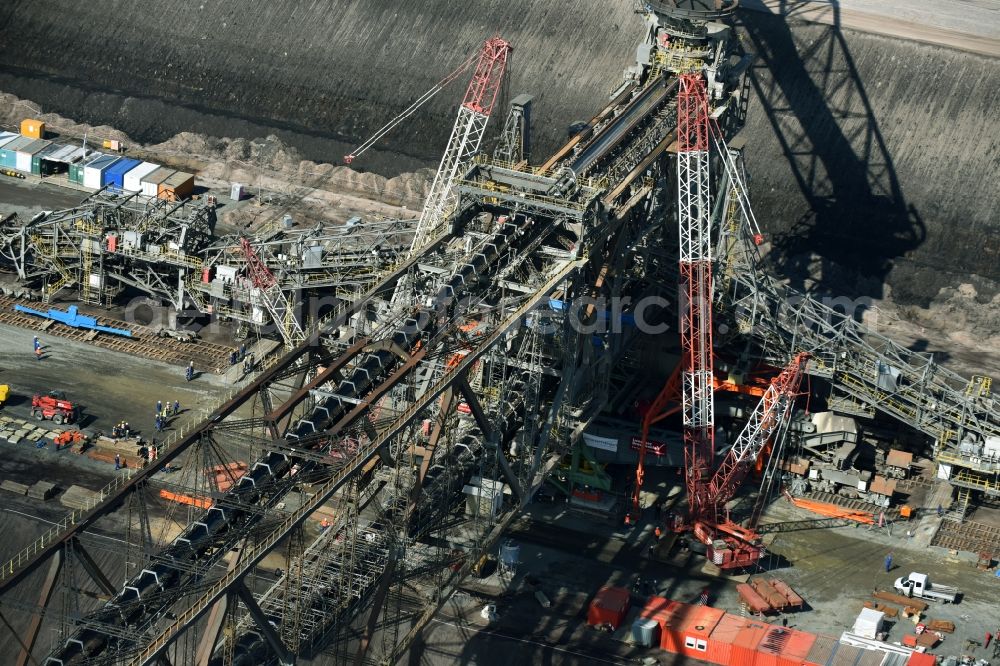 Aerial image Nochten - Dredging conveyor bridge in brown coal mine der Vattenfall Europe Sales GmbH in Nochten in the state Saxony. The company TAKRAF GmbH - Tenova exchanged at Greater excavator with a roller table of the great rocker of the 40-year-old excavator