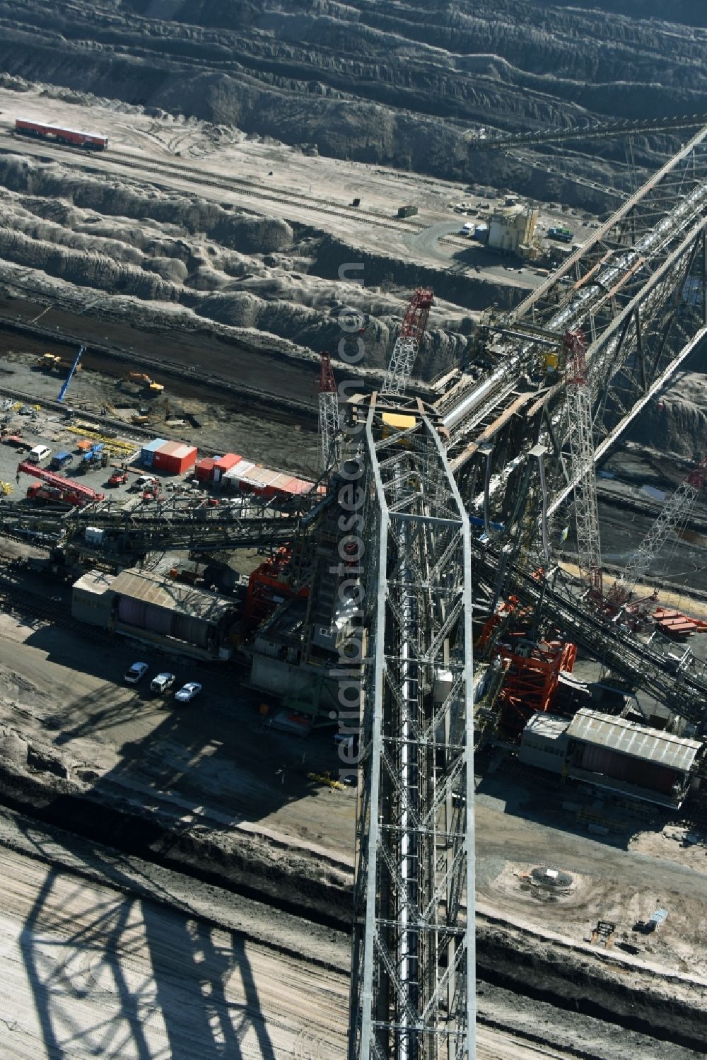 Aerial image Nochten - Dredging conveyor bridge in brown coal mine der Vattenfall Europe Sales GmbH in Nochten in the state Saxony. The company TAKRAF GmbH - Tenova exchanged at Greater excavator with a roller table of the great rocker of the 40-year-old excavator