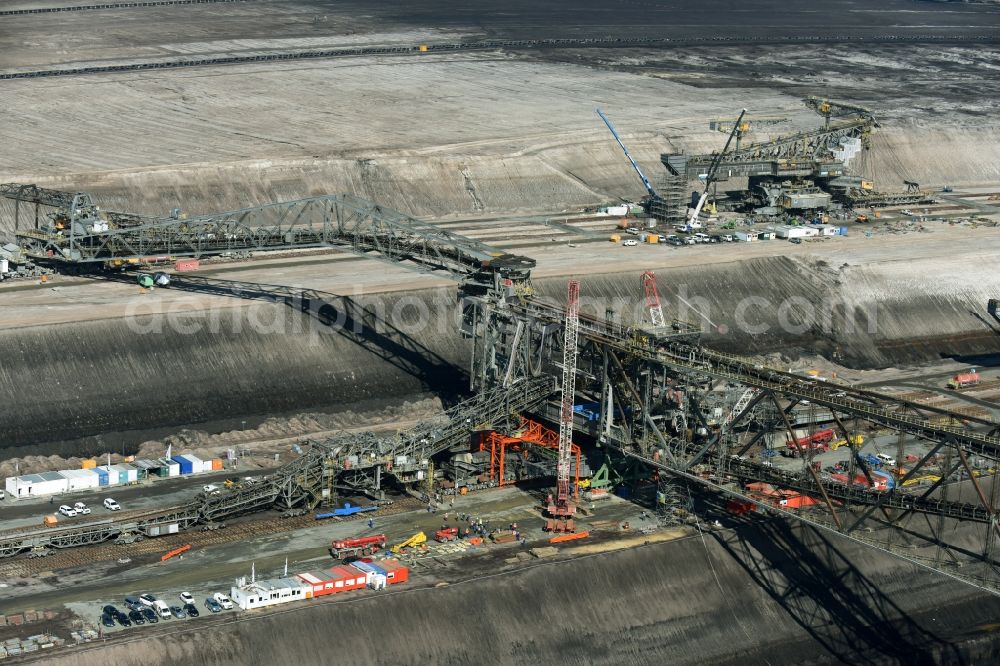 Aerial photograph Nochten - Dredging conveyor bridge in brown coal mine der Vattenfall Europe Sales GmbH in Nochten in the state Saxony. The company TAKRAF GmbH - Tenova exchanged at Greater excavator with a roller table of the great rocker of the 40-year-old excavator