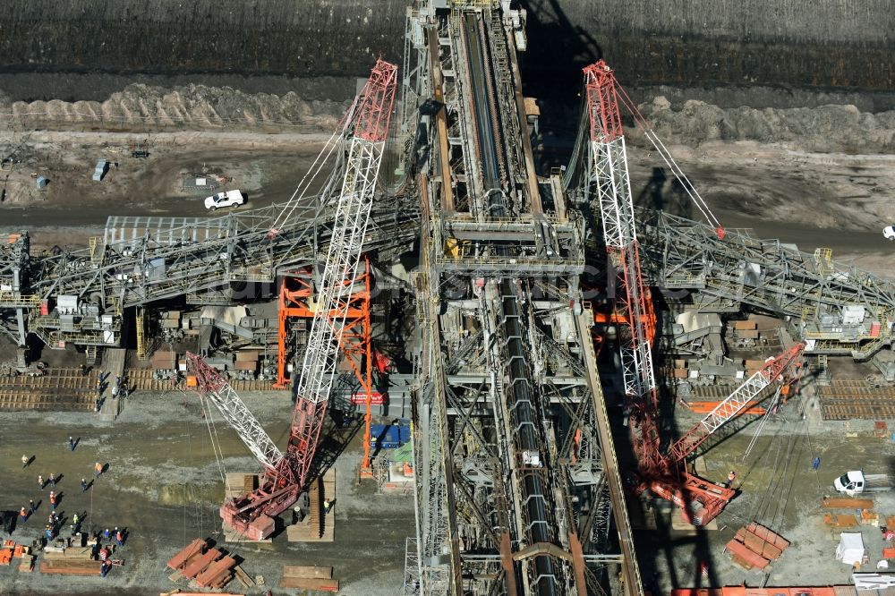 Nochten from above - Dredging conveyor bridge in brown coal mine der Vattenfall Europe Sales GmbH in Nochten in the state Saxony. The company TAKRAF GmbH - Tenova exchanged at Greater excavator with a roller table of the great rocker of the 40-year-old excavator