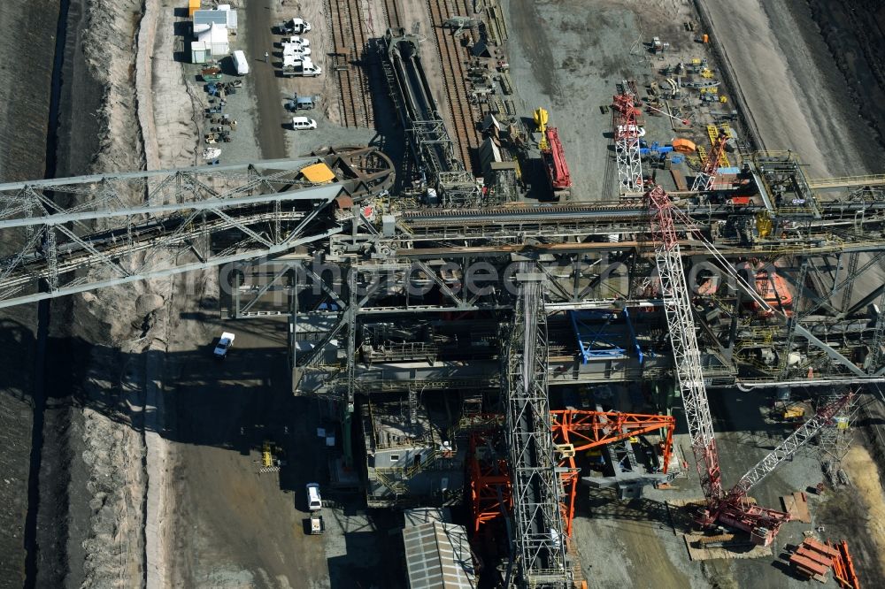 Aerial image Nochten - Dredging conveyor bridge in brown coal mine der Vattenfall Europe Sales GmbH in Nochten in the state Saxony. The company TAKRAF GmbH - Tenova exchanged at Greater excavator with a roller table of the great rocker of the 40-year-old excavator