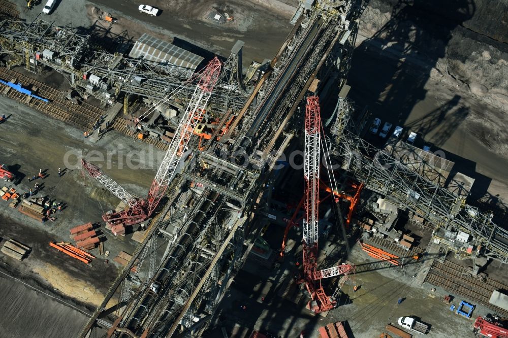 Aerial image Nochten - Dredging conveyor bridge in brown coal mine der Vattenfall Europe Sales GmbH in Nochten in the state Saxony. The company TAKRAF GmbH - Tenova exchanged at Greater excavator with a roller table of the great rocker of the 40-year-old excavator