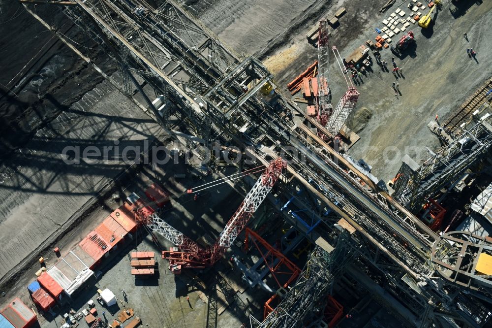 Aerial photograph Nochten - Dredging conveyor bridge in brown coal mine der Vattenfall Europe Sales GmbH in Nochten in the state Saxony. The company TAKRAF GmbH - Tenova exchanged at Greater excavator with a roller table of the great rocker of the 40-year-old excavator