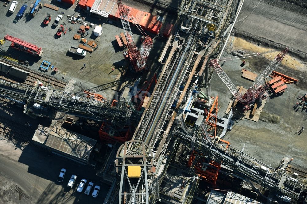 Aerial photograph Nochten - Dredging conveyor bridge in brown coal mine der Vattenfall Europe Sales GmbH in Nochten in the state Saxony. The company TAKRAF GmbH - Tenova exchanged at Greater excavator with a roller table of the great rocker of the 40-year-old excavator