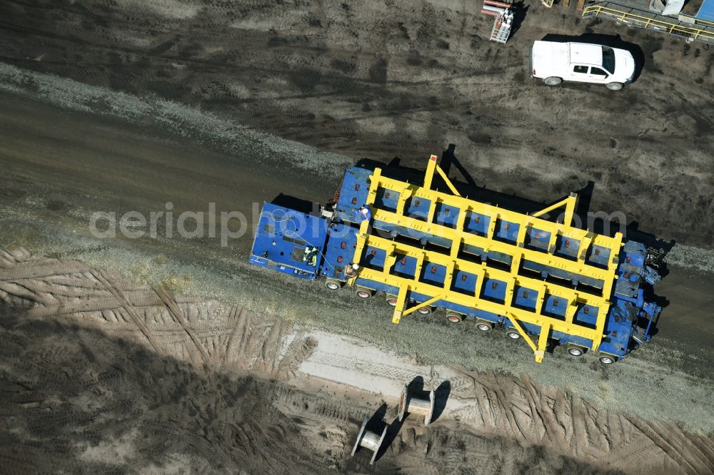 Aerial photograph Nochten - Dredging conveyor bridge in brown coal mine der Vattenfall Europe Sales GmbH in Nochten in the state Saxony. The company TAKRAF GmbH - Tenova exchanged at Greater excavator with a roller table of the great rocker of the 40-year-old excavator