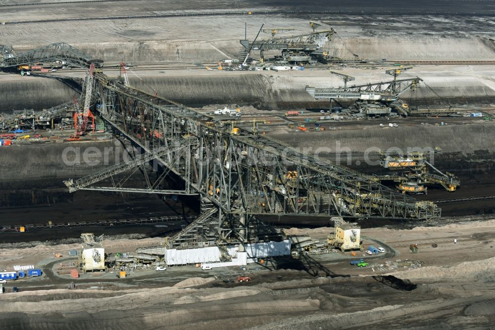 Aerial image Nochten - Dredging conveyor bridge in brown coal mine der Vattenfall Europe Sales GmbH in Nochten in the state Saxony. The company TAKRAF GmbH - Tenova exchanged at Greater excavator with a roller table of the great rocker of the 40-year-old excavator