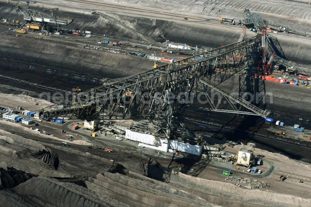 Aerial photograph Nochten - Dredging conveyor bridge in brown coal mine der Vattenfall Europe Sales GmbH in Nochten in the state Saxony. The company TAKRAF GmbH - Tenova exchanged at Greater excavator with a roller table of the great rocker of the 40-year-old excavator