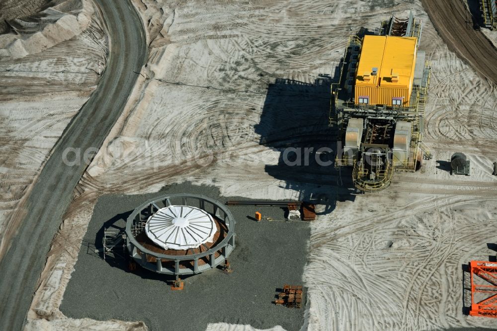 Aerial image Nochten - Dredging conveyor bridge in brown coal mine der Vattenfall Europe Sales GmbH in Nochten in the state Saxony. The company TAKRAF GmbH - Tenova exchanged at Greater excavator with a roller table of the great rocker of the 40-year-old excavator