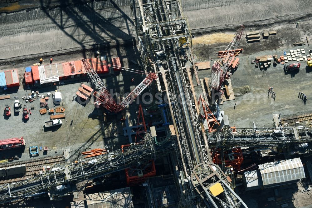 Aerial image Nochten - Dredging conveyor bridge in brown coal mine der Vattenfall Europe Sales GmbH in Nochten in the state Saxony. The company TAKRAF GmbH - Tenova exchanged at Greater excavator with a roller table of the great rocker of the 40-year-old excavator