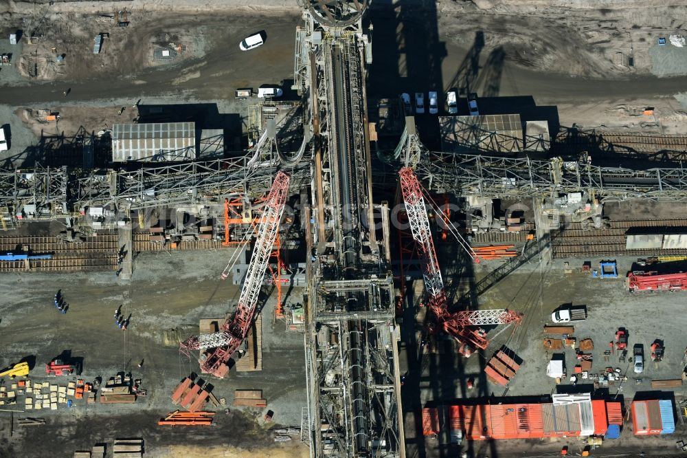 Nochten from above - Dredging conveyor bridge in brown coal mine der Vattenfall Europe Sales GmbH in Nochten in the state Saxony. The company TAKRAF GmbH - Tenova exchanged at Greater excavator with a roller table of the great rocker of the 40-year-old excavator