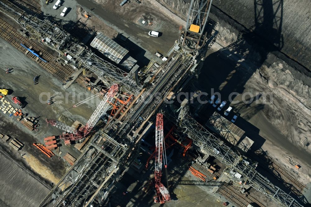 Nochten from the bird's eye view: Dredging conveyor bridge in brown coal mine der Vattenfall Europe Sales GmbH in Nochten in the state Saxony. The company TAKRAF GmbH - Tenova exchanged at Greater excavator with a roller table of the great rocker of the 40-year-old excavator