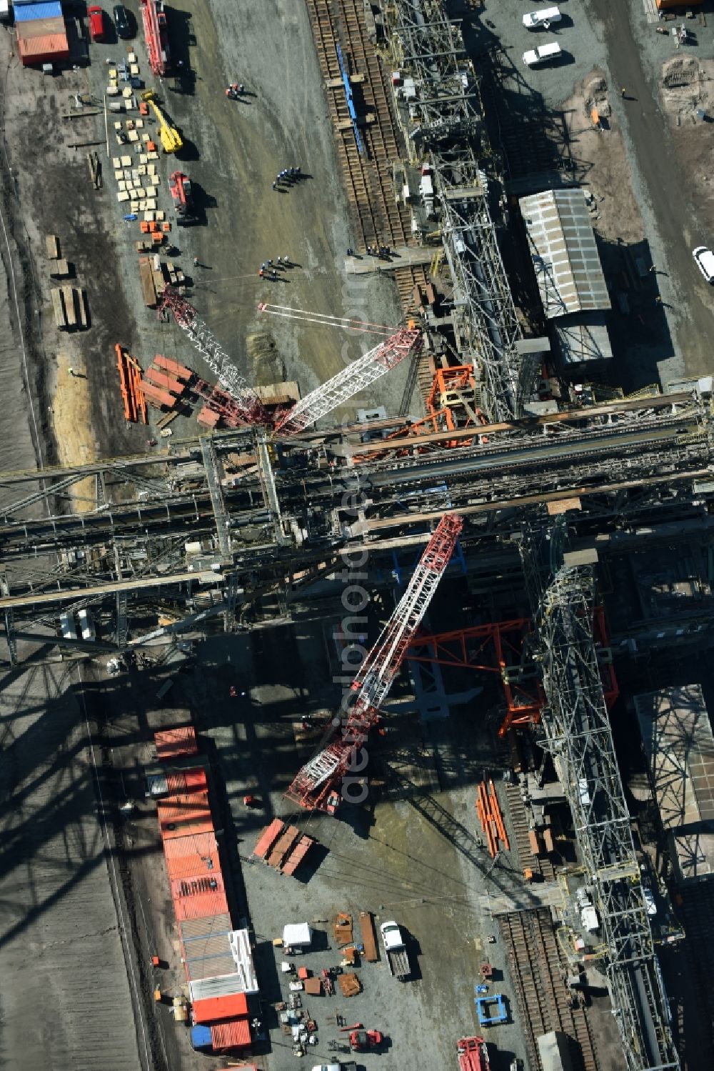 Aerial photograph Nochten - Dredging conveyor bridge in brown coal mine der Vattenfall Europe Sales GmbH in Nochten in the state Saxony. The company TAKRAF GmbH - Tenova exchanged at Greater excavator with a roller table of the great rocker of the 40-year-old excavator