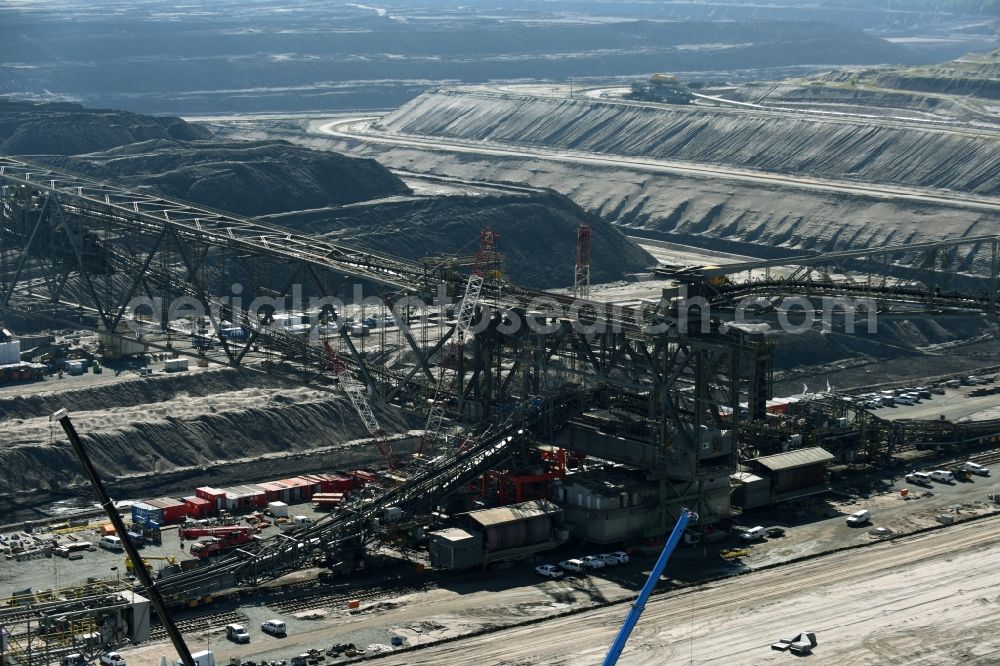 Aerial photograph Nochten - Dredging conveyor bridge in brown coal mine der Vattenfall Europe Sales GmbH in Nochten in the state Saxony. The company TAKRAF GmbH - Tenova exchanged at Greater excavator with a roller table of the great rocker of the 40-year-old excavator