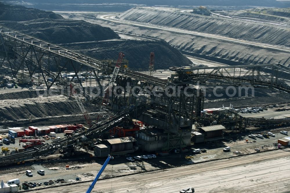 Nochten from above - Dredging conveyor bridge in brown coal mine der Vattenfall Europe Sales GmbH in Nochten in the state Saxony. The company TAKRAF GmbH - Tenova exchanged at Greater excavator with a roller table of the great rocker of the 40-year-old excavator