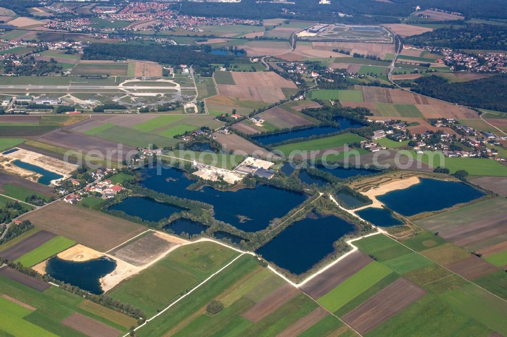 Aerial image Rosing - Lake shore and overburden areas of the quarry lake and gravel open pit of Donaumoos Kies GmbH & Co. KG in Rosing in the state Bavaria, Germany