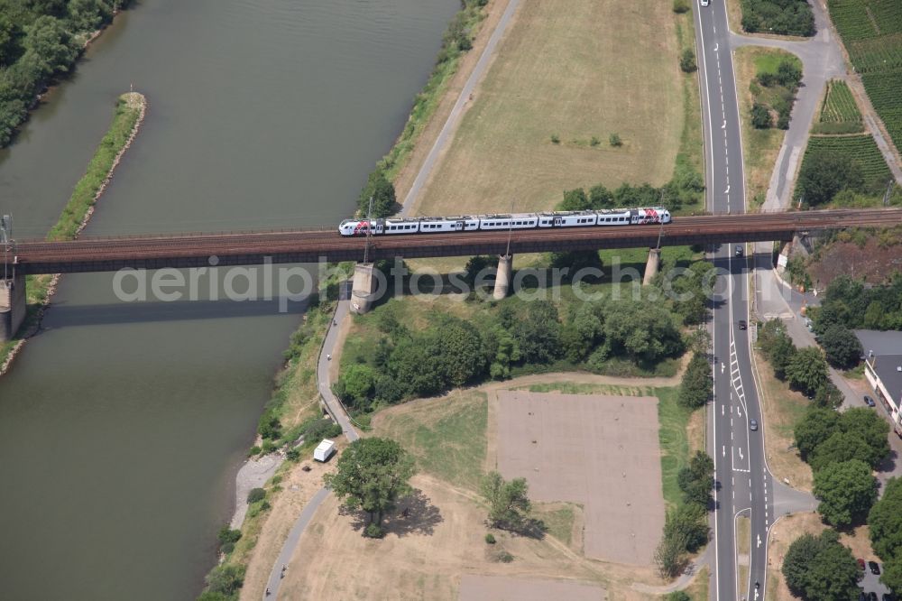 Ediger-Eller from above - Railway bridge building to route the train tracks over the Mosel in Ediger-Eller in the state Rhineland-Palatinate, Germany, used by a passenger train