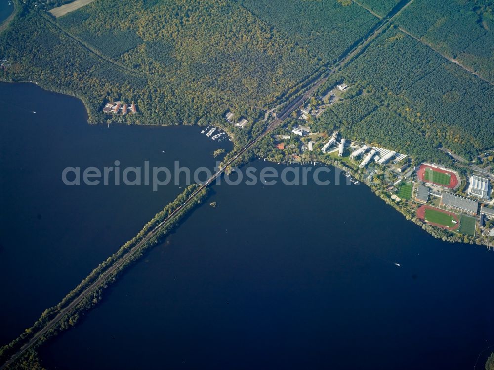 Aerial photograph Potsdam - Railway bridge construction to route the train tracks over the Templiner See with view of the Olympiastuetzpunkt in Potsdam in the state Brandenburg