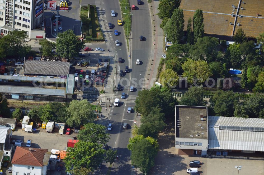 Aerial image Berlin - Crossing Buckower Chaussee at the railway line Dresdner Bahn to the same S-Bahn station in Berlin