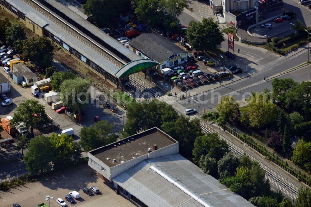 Berlin from above - Crossing Buckower Chaussee at the railway line Dresdner Bahn to the same S-Bahn station in Berlin